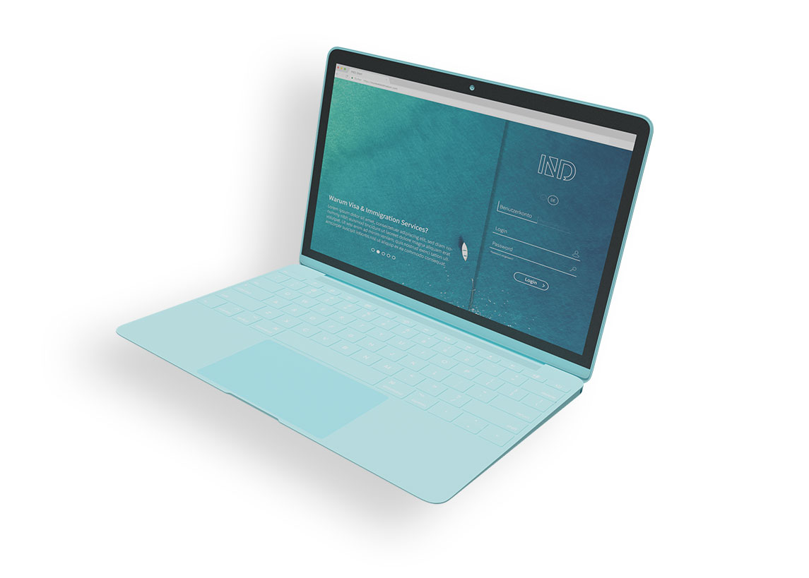 turquoise laptop showing IND homepage